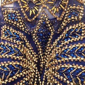 Lucci Lu , size 8 , floor length, Royal Blue w/gold embellishments. Wowza!!! 🌟